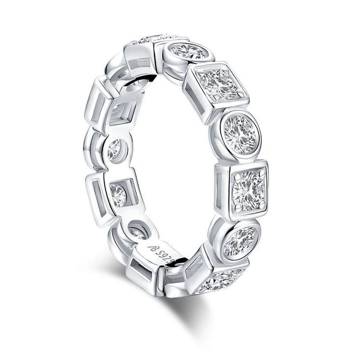 Unique Embrace Round Moissanite Wedding Band